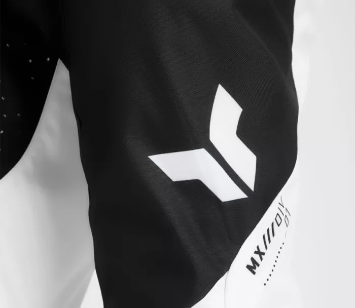 Kalhoty na motokros Thor Launchmode Storm black/white